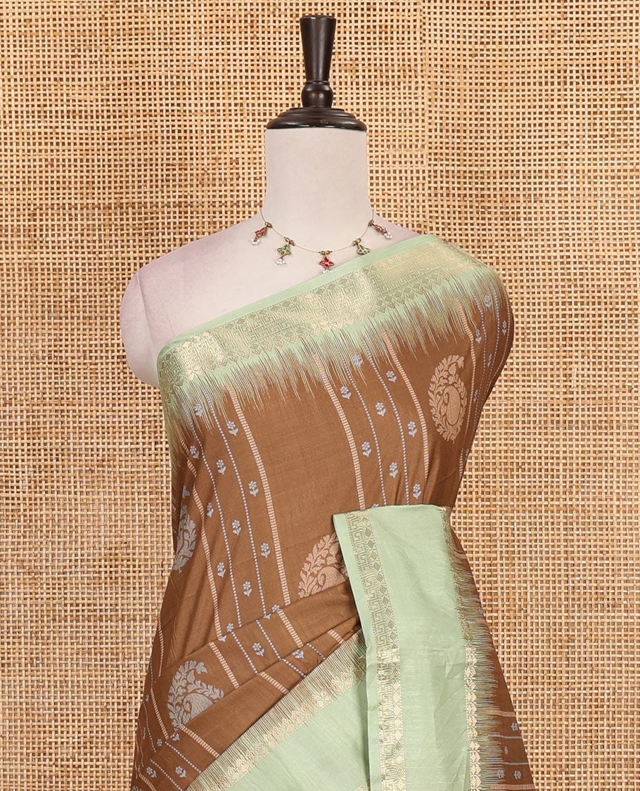Brown floral, manga and striped katan silk saree, contrast rettai pettu temple border of diamond and Greek key design, jaal pallu, and contrast printed blouse