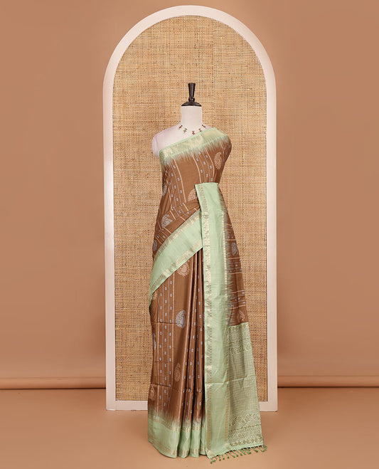 Brown floral, manga and striped katan silk saree, contrast rettai pettu temple border of diamond and Greek key design, jaal pallu, and contrast printed blouse