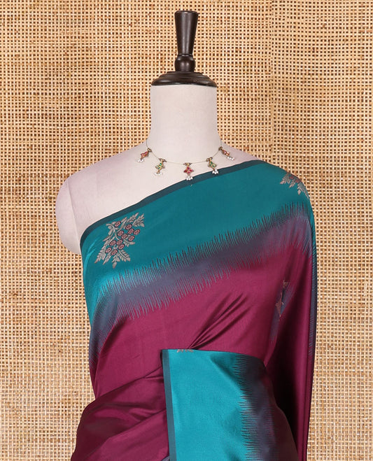 Purple-blue floral buttas elite soft silk saree, contrast floral buttas border, and pallu of Mughal-style intricate zari designs