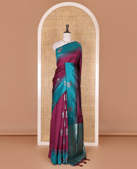 Purple-blue floral buttas elite soft silk saree, contrast floral buttas border, and pallu of Mughal-style intricate zari designs