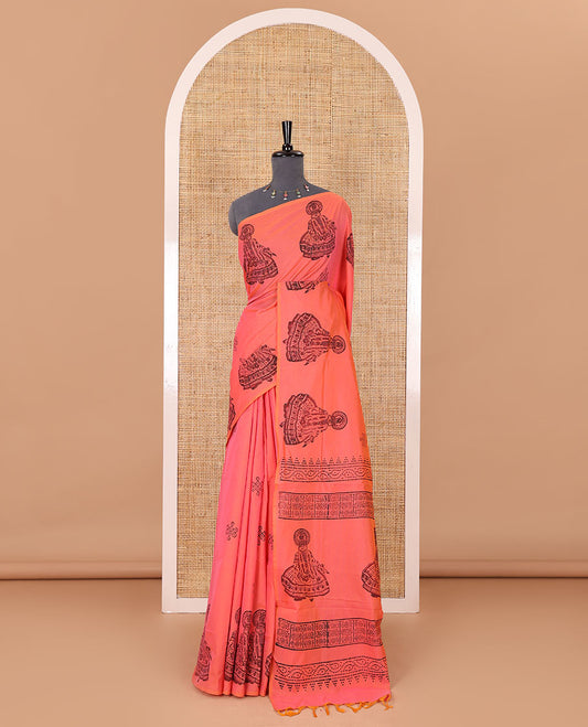 Borderless pink kolam and kathakali motifs printed South cotton saree with a matching blouse, and a contrast printed blouse