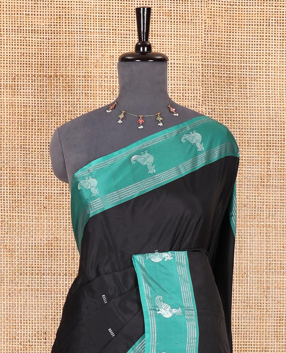 Black zari buttas Kanchi silk saree, contrast peacock motifs zari green border, zari design pallu, and a matching blouse