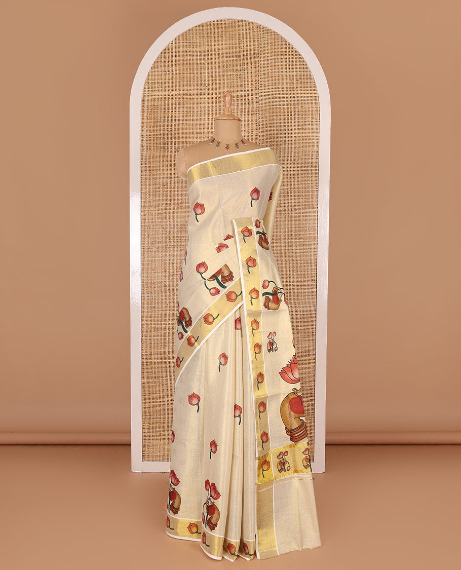 Gold-red pichwai lotus printed Kerala cotton saree, gold zari with lotus printed border, pallu features hand-holding lotus motifs, and lotus printed blouse