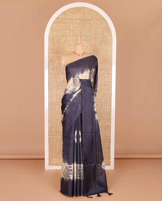 Borderless navy blue shibori printed with shell motifs, blockprinted Manipur tussar saree, shibori printed pallu, and a plain matching blouse