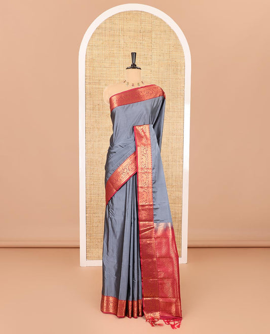 Grey plain luxury soft silk saree, contrast traditional temple zari border of elephant motifs, geometric zari pallu, and a contrast jacquard blouse