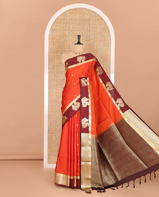 Rust orange and coffee brown zari buttas semi-soft silk saree, contrast peacock border, traditional zari design pallu, and a contrast zari bordered blouse