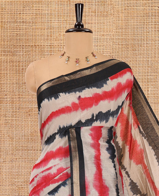 Black shibori printed muslin cotton saree, contrast zari border, village theme printed pallu, and a contrast dots printed blouse