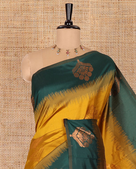 Mustard floral zari buttas Kanchi silk saree, contrast floral motifs zari woven border, butta enclosed jaal pallu, and a zari design pallu