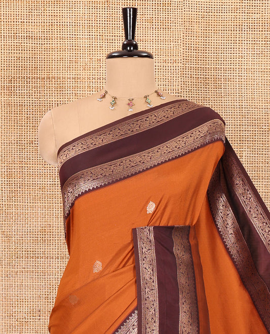 Rust orange zari buttas kanchi soft-silk saree, contrast traditional zari design rettai pettu border of floral creeper designs, intricate pallu, and a contrast zari design blouse