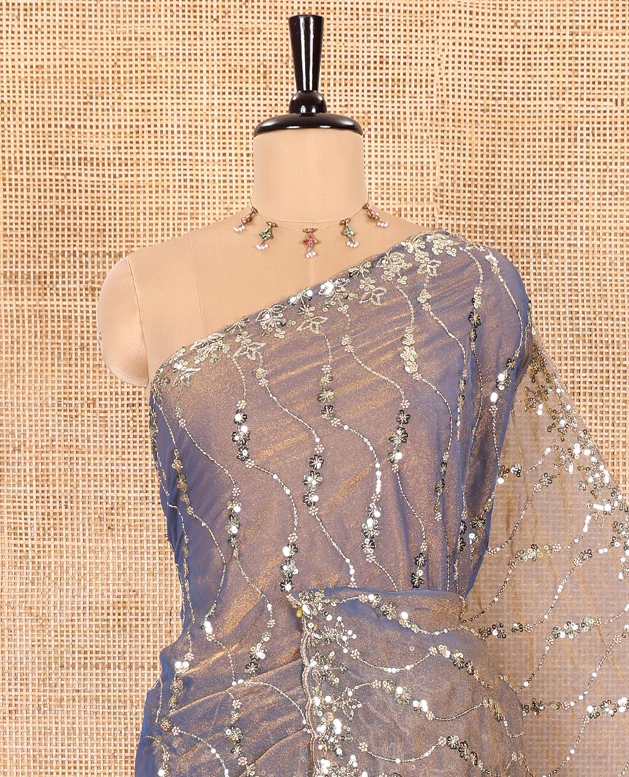 Blue Shimmer Chiffon Saree Elegantly Embellished with Sequins and Thread-Woven Ogee Patterns All Over the Body, Featuring a Scalloped Sequins Work Border, and Paired with a Matching Blouse Embellished with Sequins Work
