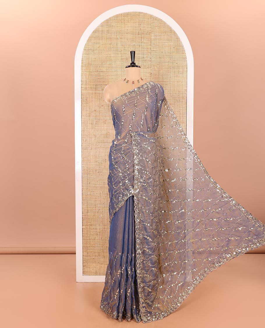 Blue Shimmer Chiffon Saree Elegantly Embellished with Sequins and Thread-Woven Ogee Patterns All Over the Body, Featuring a Scalloped Sequins Work Border, and Paired with a Matching Blouse Embellished with Sequins Work