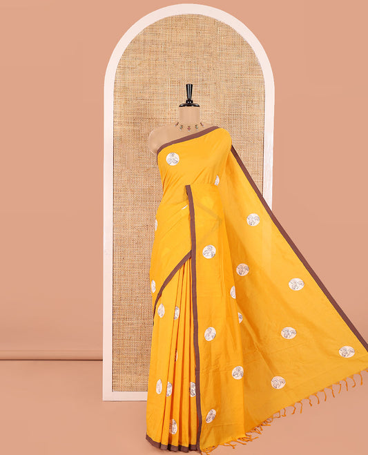 Yellow South Cotton Saree Featuring Eagle Motifs Enclosed Circles, Highlighted with a Contrast Border, and a Contrast Floral Motifs Block Printed Blouse