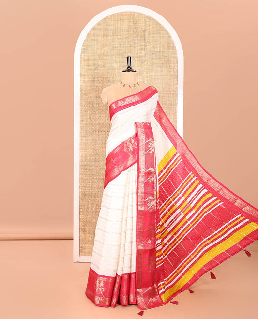 Cream Moss Chiffon Saree Embellished with Zari Stripes and Temple Designs, Complemented by a Contrast Traditional Zari Border of Parrot Motifs, Pallu Accentuated with Colorful Stripes, and Paired with a Contrast Blouse