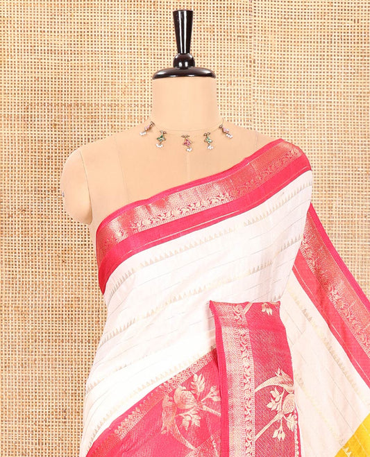 Cream Moss Chiffon Saree Embellished with Zari Stripes and Temple Designs, Complemented by a Contrast Traditional Zari Border of Parrot Motifs, Pallu Accentuated with Colorful Stripes, and Paired with a Contrast Blouse