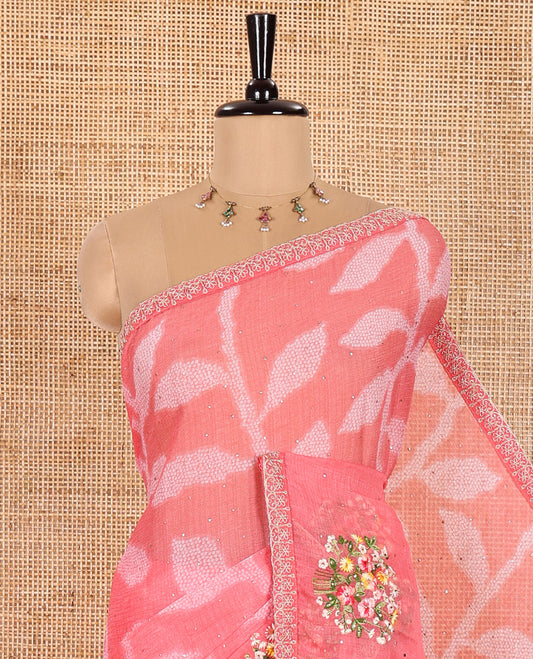 Pink Weightless Chiffon Saree Spotlighted with Leaf Vine Print, Sparkling Glitter Work, and Colorful Floral Motifs Thread Embroidery on Its Body, Comes with a Piping Embroidered Border, and a Matching Jaal Embroidered Blouse