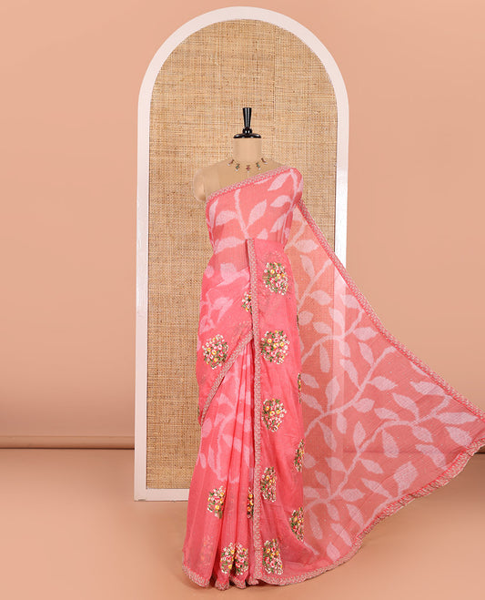 Pink Weightless Chiffon Saree Spotlighted with Leaf Vine Print, Sparkling Glitter Work, and Colorful Floral Motifs Thread Embroidery on Its Body, Comes with a Piping Embroidered Border, and a Matching Jaal Embroidered Blouse