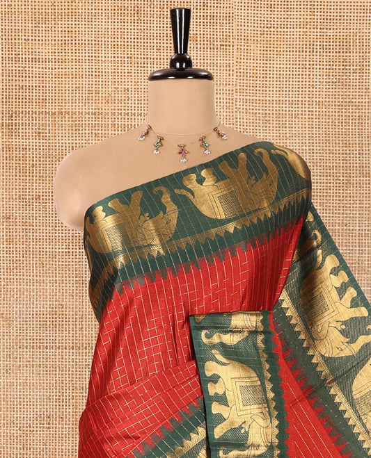 Red Semi-Taffeta Saree, Enthralled with Medium-Zari Checks All Over Its Body, Complemented by Contrast Temple Border Featuring Elephant Motifs, Contrast Checked Pallu, and Paired with a Matching Blouse