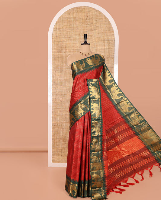 Red Semi-Taffeta Saree, Enthralled with Medium-Zari Checks All Over Its Body, Complemented by Contrast Temple Border Featuring Elephant Motifs, Contrast Checked Pallu, and Paired with a Matching Blouse