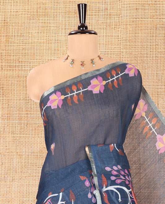 Blue Linen Cotton Saree, Adorned with Floral Motifs in Its Body, Highlighted by a Self-Border of Floral and Peacock Print, Pallu of Peacock Print, and Paired with a Matching Printed Blouse