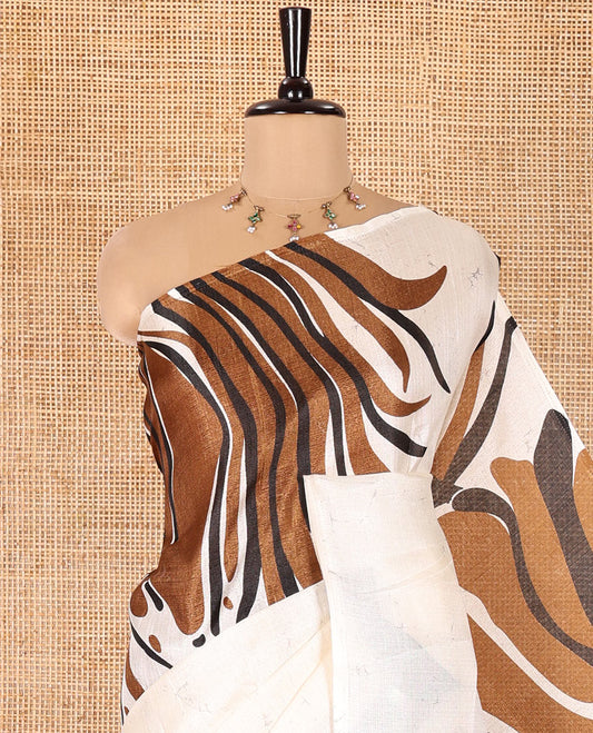 Borderless Cream and Brown Art Khadi Cotton Saree, Detailed with Batik Print-Style Vines Print on Its Body, Self-Pallu of Batik Print, and Paired with a Printed Blouse