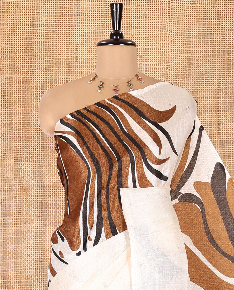 Borderless Cream and Brown Art Khadi Cotton Saree, Detailed with Batik Print-Style Vines Print on Its Body, Self-Pallu of Batik Print, and Paired with a Printed Blouse