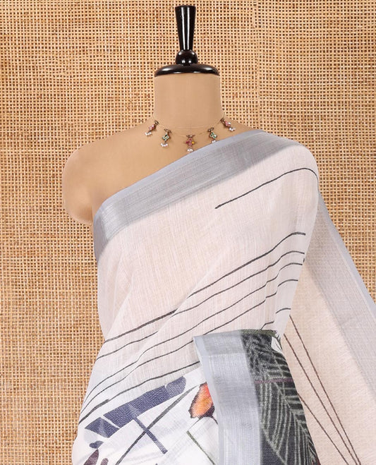 Grey Linen Cotton Saree, Beautified with Tropical Floral Print on Its Body, Complemented by a Contrast Plain Border, Floral Printed Pallu, and Paired with a Contrast Blouse