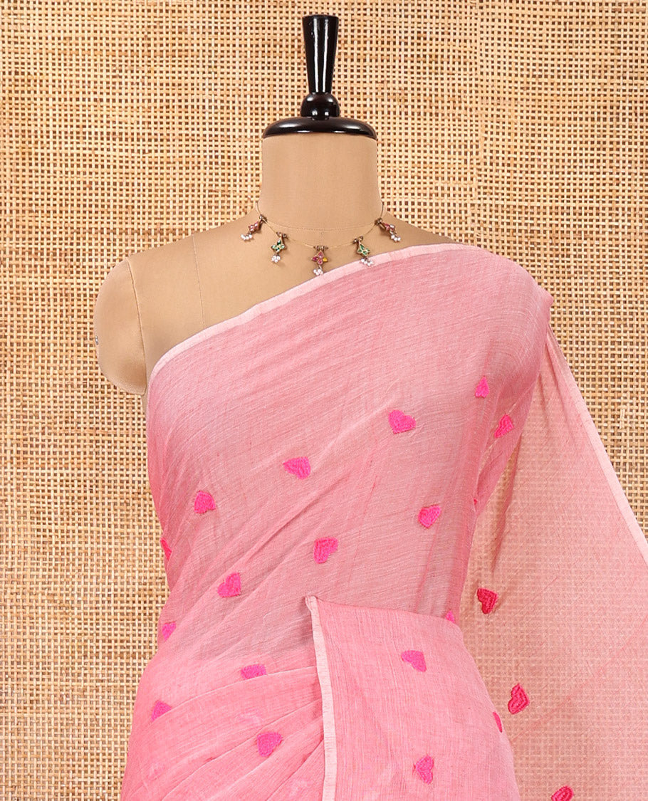 Borderless Baby Pink Mul Cotton Saree, Delicately Woven with Heart Motifs Embroidered All Over Its Body, a Self-Pallu, and Paired with a Matching Blouse