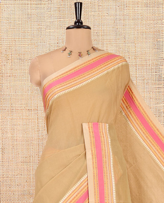 Chikku Plain Mercerised Cotton Saree, Complemented by Contrast Traditional Border, Striped Pallu, and a Matching Blouse