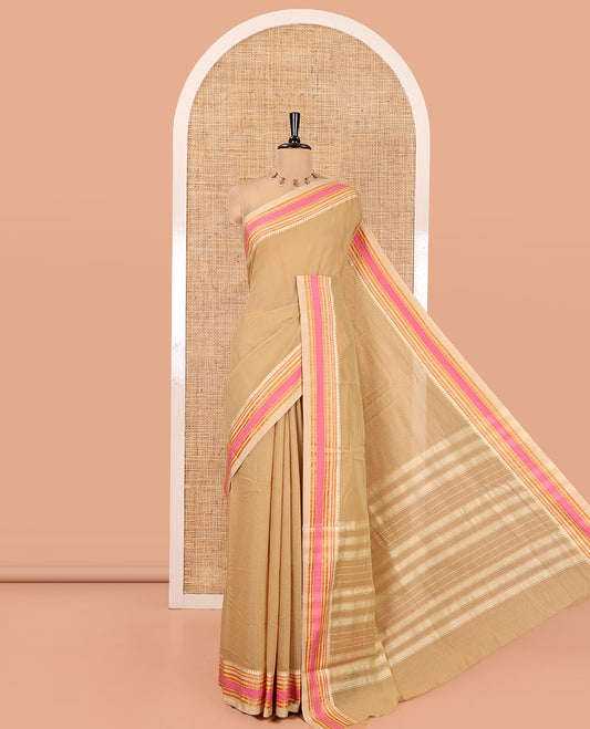 Chikku Plain Mercerised Cotton Saree, Complemented by Contrast Traditional Border, Striped Pallu, and a Matching Blouse