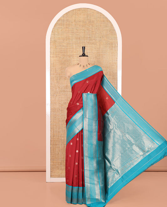 Maroon Kanchi Silk Saree Features Mayil-Chakram Buttas, a Contrast Traditional Border, Jaal Pallu, and a Contrast Blouse