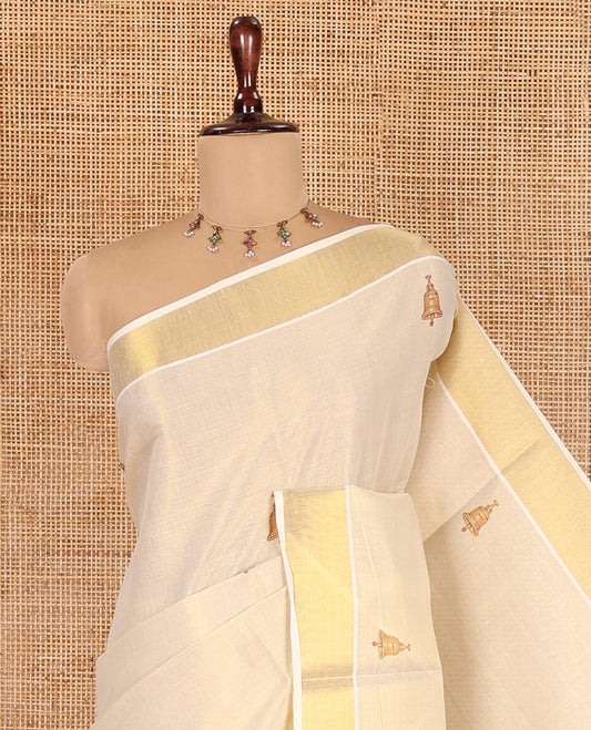 Gold Kerala Cotton Saree, Graced with Bell Motif Print, a Zari Border, Pallu of Elephant Motifs, and a Contrast Blouse