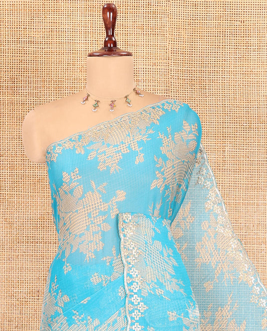 Blue Chiffon Saree Features Abstract Print, a Scallop Sequins Work Border, and Contrast Blouse