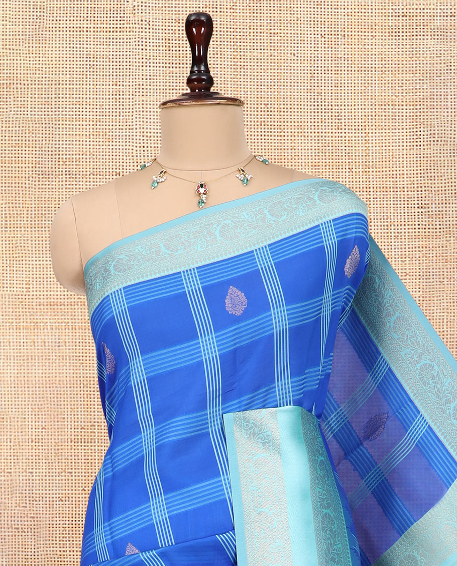 Blue Art Kanchi Silk Saree Features Butta Enclosed Checks, a Contrast Temple Rettai Pettu Border, Grand Pallu, and a Contrast Blouse