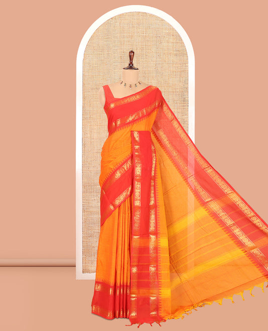 Orange Plain Chettinad Cotton Saree, a Contrast Rettai Pettu Peacock-Chakra Temple Border, Striped Pallu, a Matching Blouse