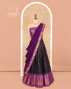 Navy Blue-Purple Sungudi Cotton Half-Saree Features Checked Skirt, Contrast Gopuram Border, Contrast Blouse, and Zari-Bordered Syska Georgette Dhavani