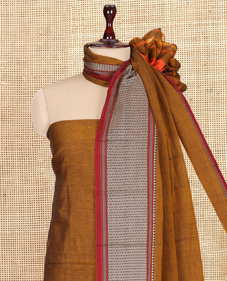 Mustard Mercerised Cotton Material Churidar Features Plain Top, Contrast Traditional Thread Border, Plain Bottom, Matching Dupatta