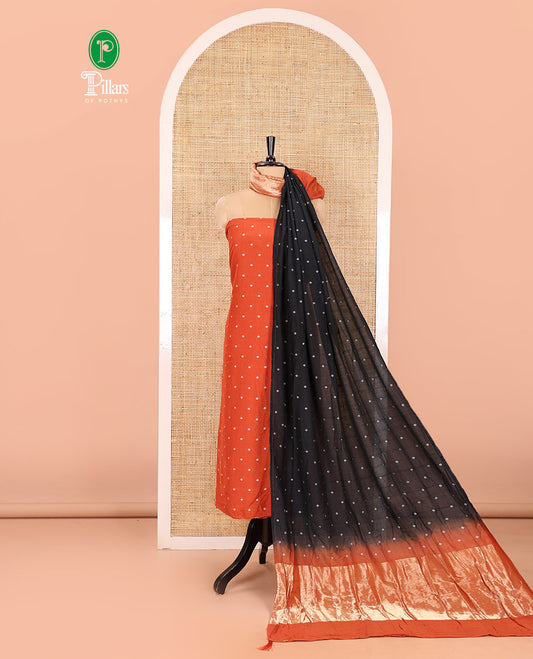 Orange and Black Semi-Silk Material Churidar Set, Adorned with Bandhani Dots Print, Comes with a Plain Santoon Bottom, and Paired with a Double-Colored Dupatta of Bandhani Dots Print