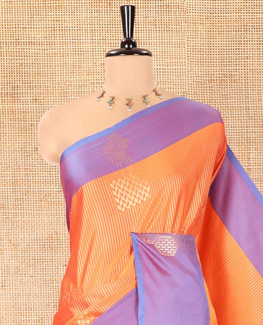 Orange Fancy Soft Silk Saree, Embellished with Zari Buttas and Zari Stripes, Complemented by a Contrast Border of Hexagon-Shaped Designs, Majestically Detailed Pallu, and Paired with a Contrast Blouse