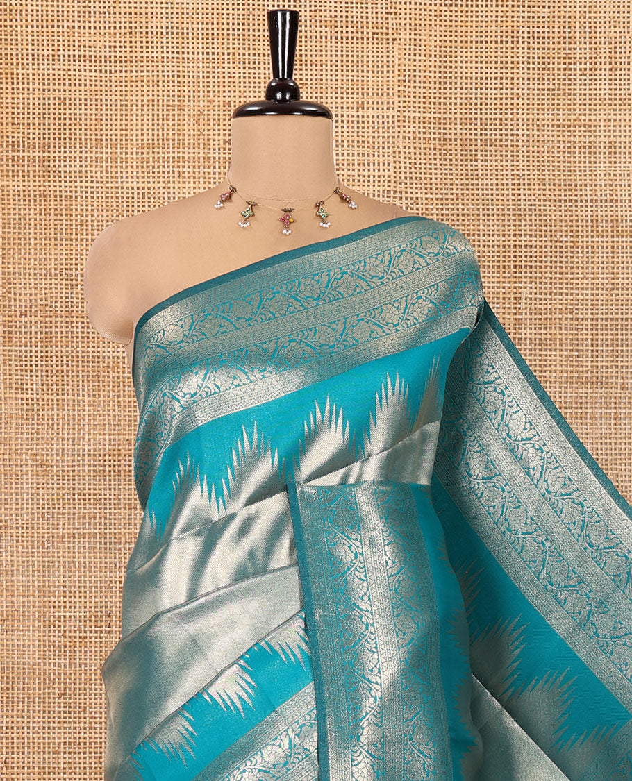 Rama Green Litchi Saree Features Tissue-Zari Weave, a Temple Kodi Visiry Border, Grand Pallu and a Matching Blouse