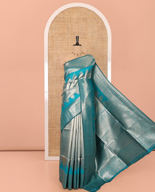 Rama Green Litchi Saree Features Tissue-Zari Weave, a Temple Kodi Visiry Border, Grand Pallu and a Matching Blouse