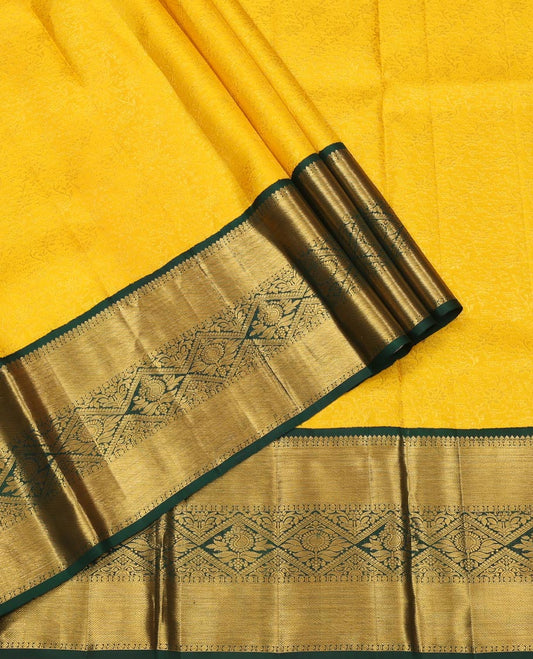 Yellow Pure Silk Half-Saree, Sparsely Woven with Floral Jacquard All Over Its Skirt, Complemented by a Contrast Korvai Border of Thilakam Mokku, Paisa, and Diamond Designs, Paired with a Contrast Blouse, and Comes with a Jaal Design Dhavani