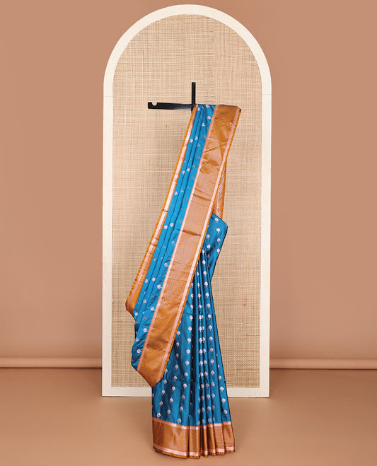 Blue semi-soft silk saree with zari buttas, contrast traditional zari design border & pallu of geometric designs