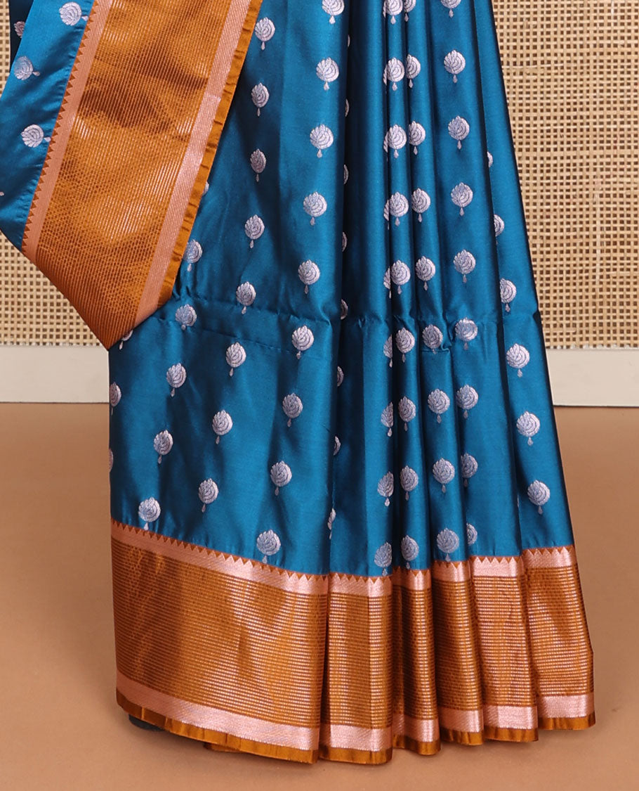 Blue semi-soft silk saree with zari buttas, contrast traditional zari design border & pallu of geometric designs