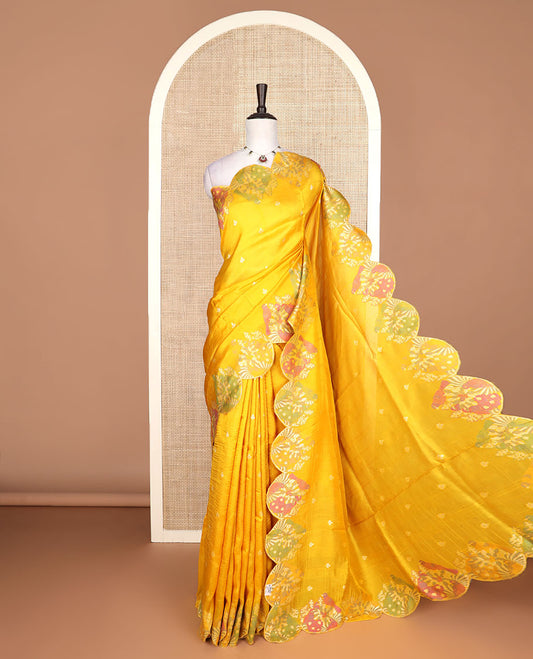 Bright yellow Matka silk saree features rudraksham motifs, scallop floral motifs and bird embossed thread embroidery border