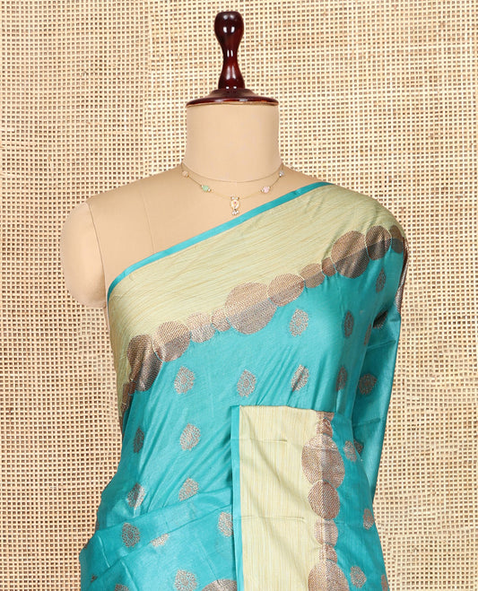 Blue Tusser Silk Saree, Ornamented with Zari Buttas, a Contrast Zari Border, Grandly Decked Up Pallu, and a Matching Blouse