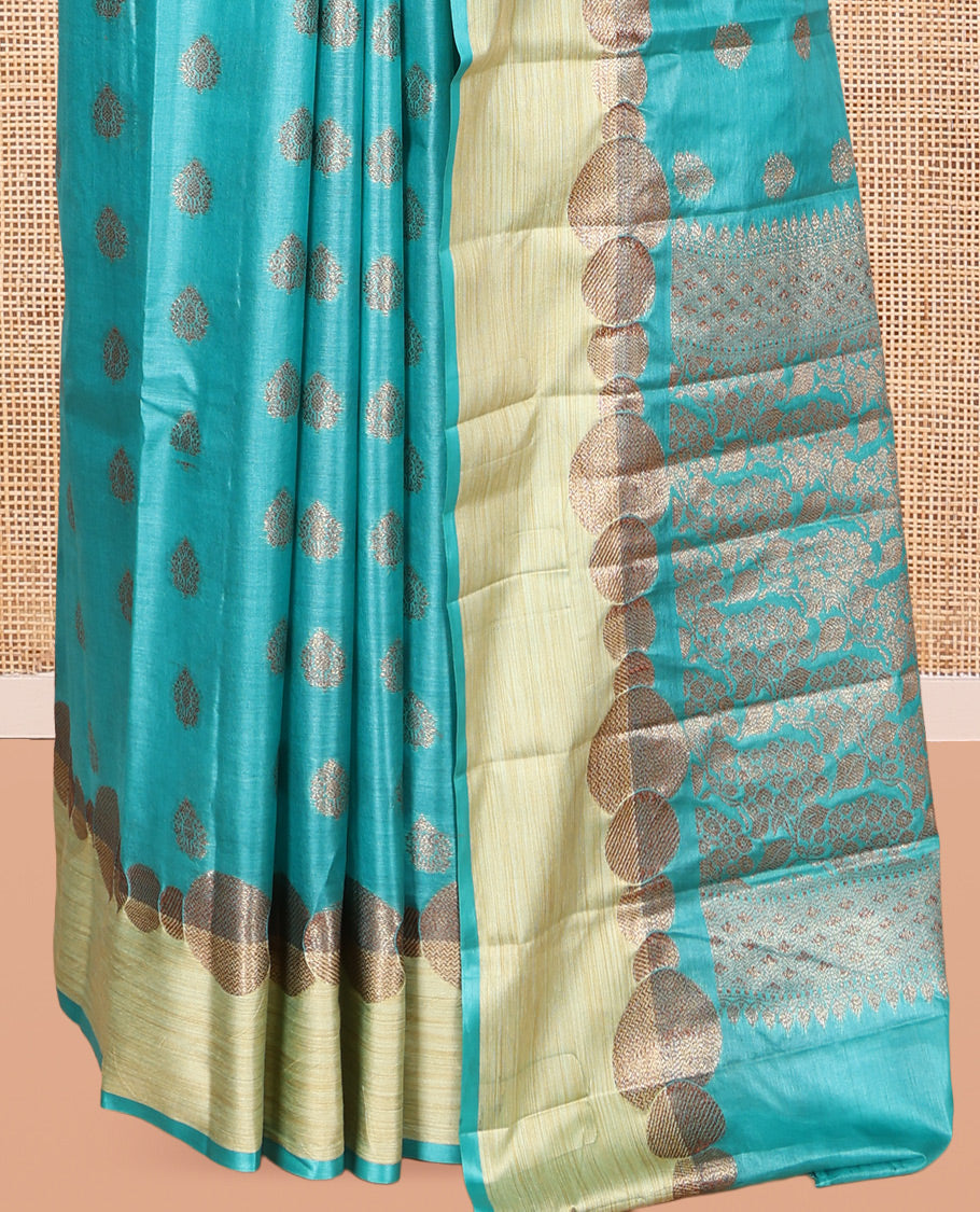 Blue Tusser Silk Saree, Ornamented with Zari Buttas, a Contrast Zari Border, Grandly Decked Up Pallu, and a Matching Blouse
