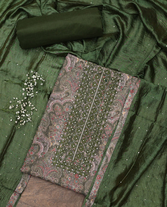 Green material chudidar set, intricately paisleys printed and neck work top, plain bottom and sequins striped dupatta