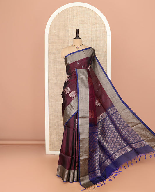 Maroon Semi Uppada Saree Elegantly Framed with Zari Buttas, Complemented by a Contrasting Border, Pallu Featuring Intricate Zari Designs, and Paired with a Contrast Blouse
