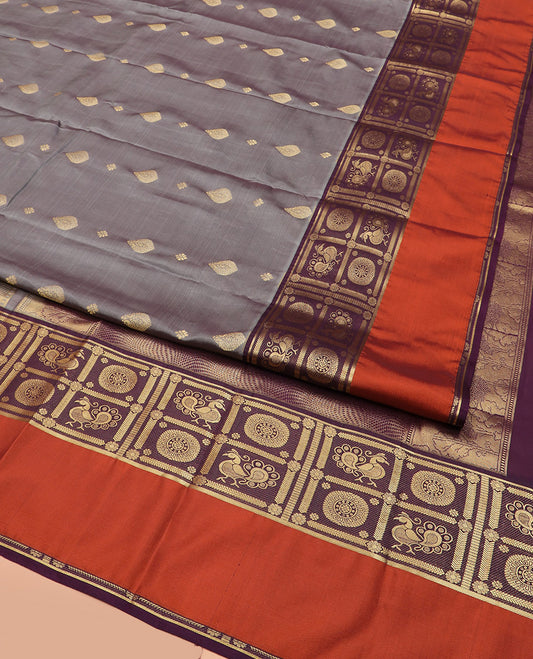 Grey Vasundhara Lite Silk Mix Saree, Opulently Embellished with Zari Buttas, Complemented by Contrast Kal Eragina Border of Annam Chakram Designs, Scintillating 3d Textured-Like Zari Woven Pallu, and Paired with a Contrast Blouse