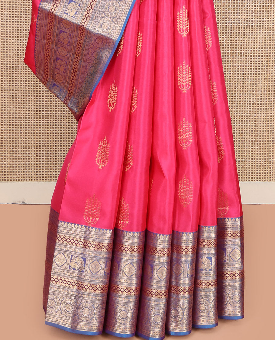 Pink Vasundhara Lite Silk Mix Saree, Beautified with Deepam Buttas, Complemented by a Contrast Border of Thilakam Mokku, Poun, Muthu, Diamond and Chakram Designs, Pallu Steeped with Chakram Designs, and Paired with a Contrast Blouse